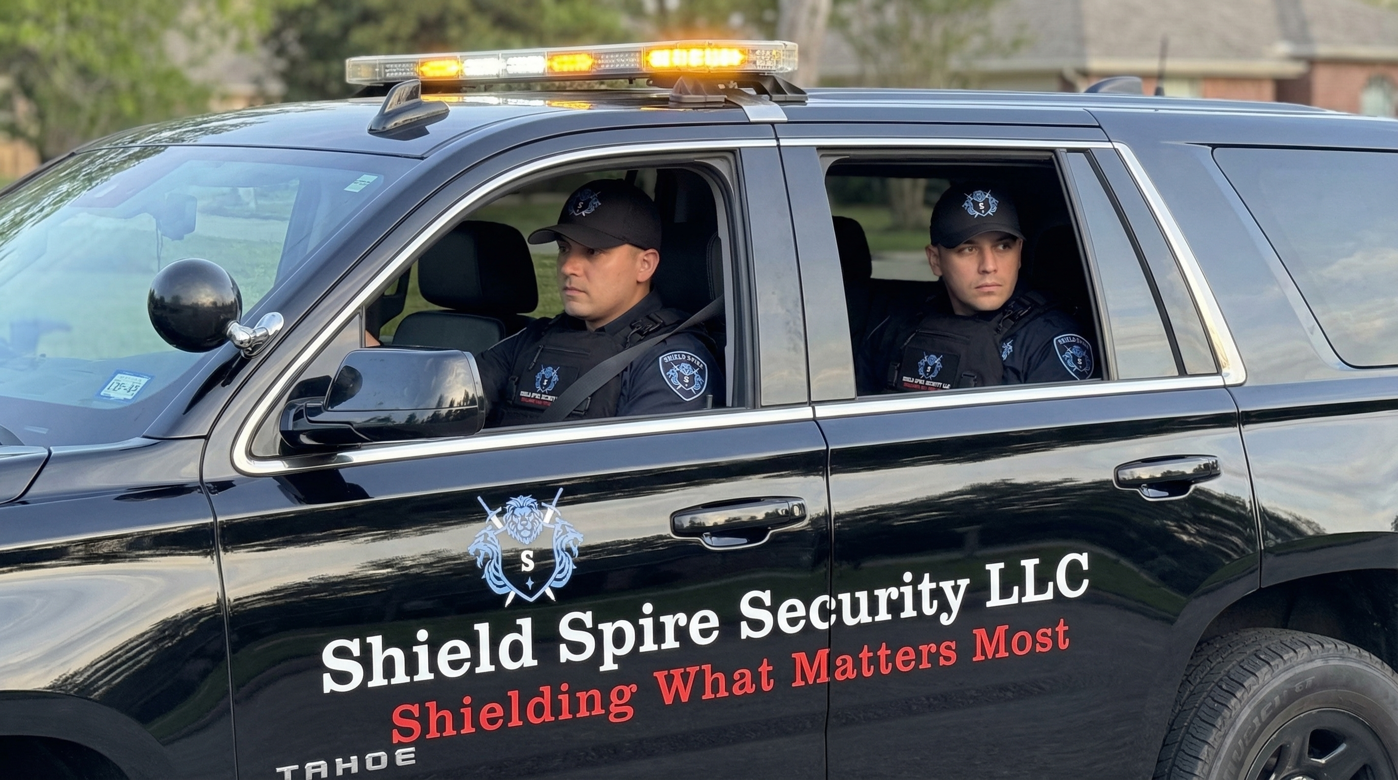 Shield Spire Security patrol vehicle and licensed security officers providing escort, patrol, and security services throughout Texas.
